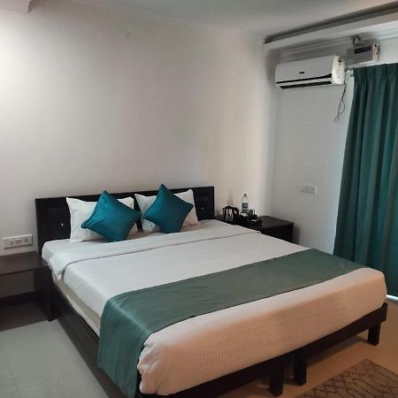 Square Inn Devanahalli Bagian luar foto